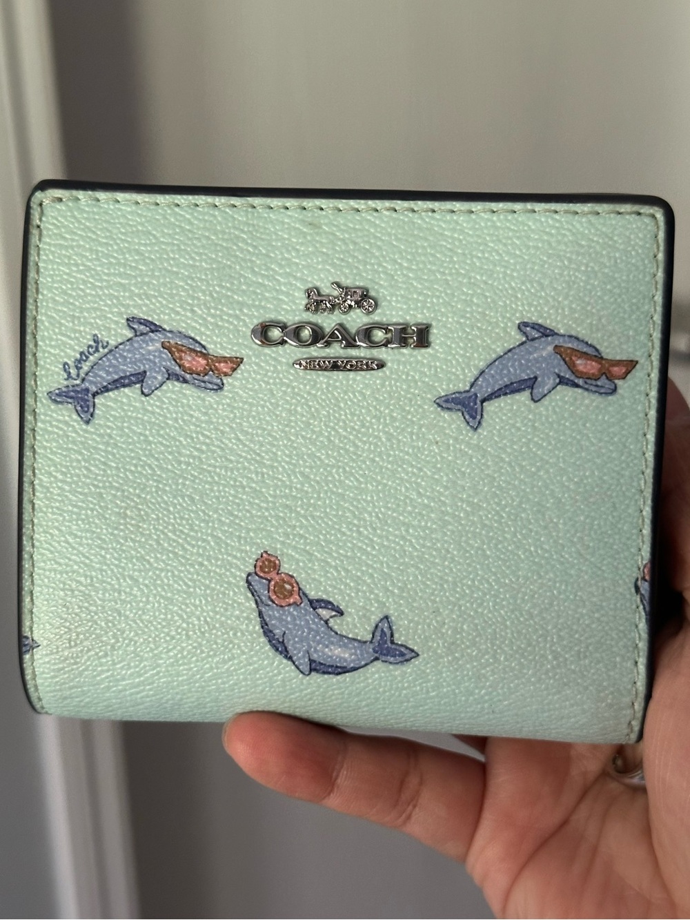 Coach Snap Wallet with Dolphins motif